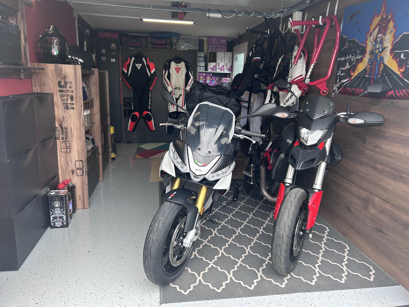 The B-Side of my workshop with two of my bikes. The beauty and the beast.